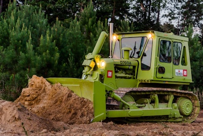Terex D700A dozer pushing dirt lights on