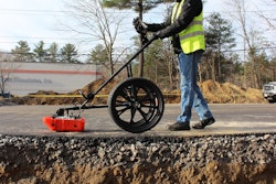 GSSI UtilityScan DF pushcart pushed by worker on road detects underground utilities
