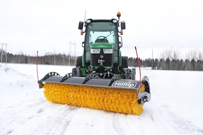 Hilltip SweepAway Rotary Broom on tractor in snow
