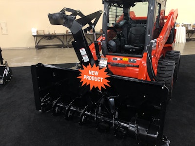 Kubota snowblower attachment on skid steer in showroom