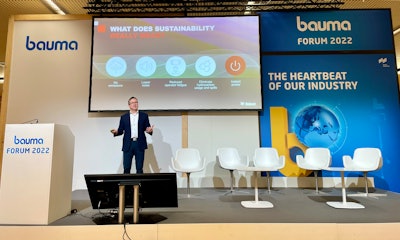 Joel Honeyman on stage at Bauma Forum