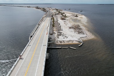 Sanibel Causeway repairs Superior Construction rebuilt roadway beside washed-out section