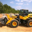 Komatsu WA270-8 wheel loader scooping aggregate