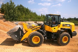 Komatsu WA270-8 wheel loader scooping aggregate