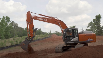 Bryan Furnace host of The Dirt test runs hitachi ZX210LC-6 HP excavator