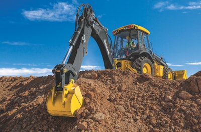 John Deere 310SL backhoe digging in dirt pile