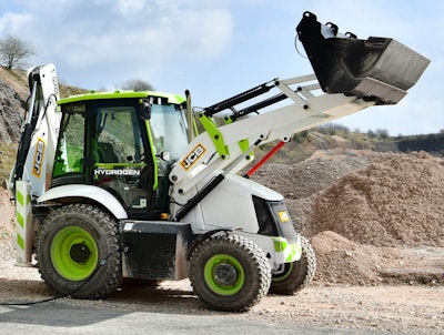 JCB hydrogen backhoe loader bucket raised dirt quarry