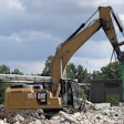 Montabert SDT Multiprocessor attachment on a Cat excavator