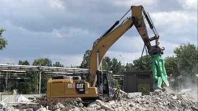 Montabert SDT Multiprocessor attachment on a Cat excavator