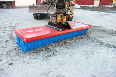 SweepAway Push Broom Attachment on an excavator
