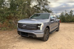 Ford F-150 Lightning parked in dirt area