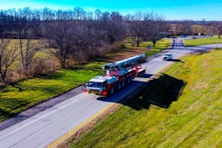 Link-Belt 300 AT all-terrain crane driving down the road