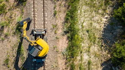 Overhead view of Mecalac 136MRail on tracks
