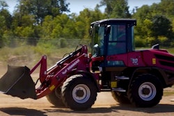 Yanmar V10 compact wheel loader riding on dirt