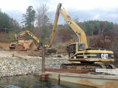 Cat excavator on barge
