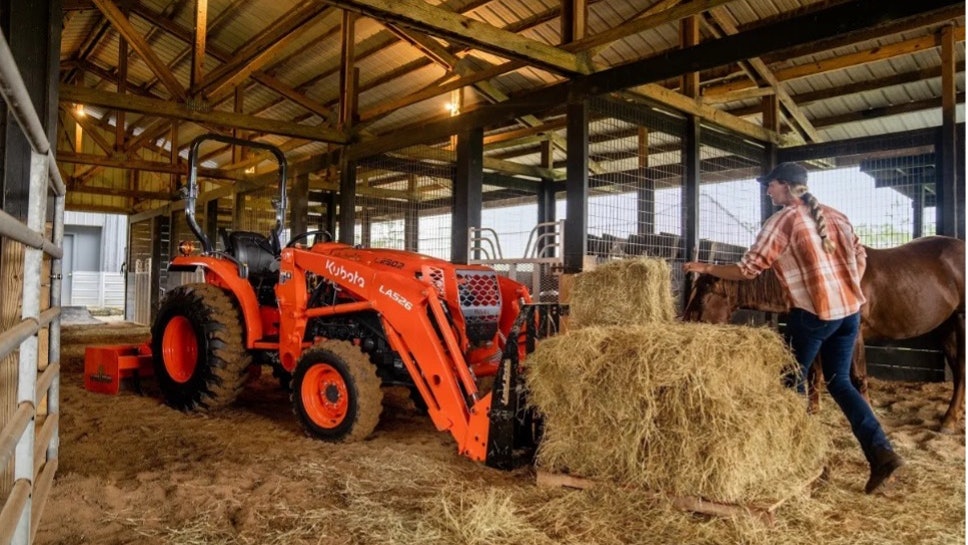 Kubota L02 Series tractor in use in barn