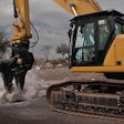 Caterpillar 352 Straight Boom Demolition Excavator breaking concrete