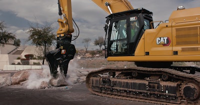 Caterpillar 352 Straight Boom Demolition Excavator breaking concrete