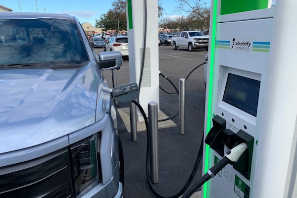 Ford F-150 Lightning charging at Electrify America station