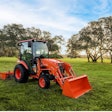 Kubota LX20 compact tractor on grass field