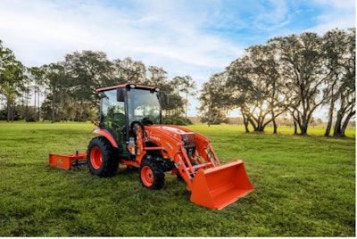 Kubota LX20 compact tractor on grass field