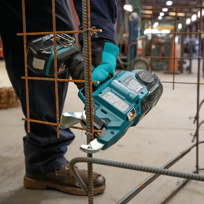 18V LXT Deep Capacity Rebar Tying Tool cutting rebar in shop