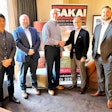 Executives from Sakai and Taylor Construction Equipment