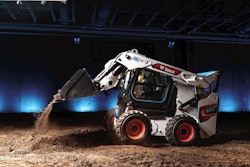 Bobcat S7X dumping bucket