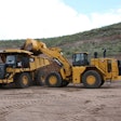 Cat 988K XE wheel loader loading truck