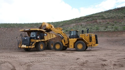 Cat 988K XE wheel loader loading truck