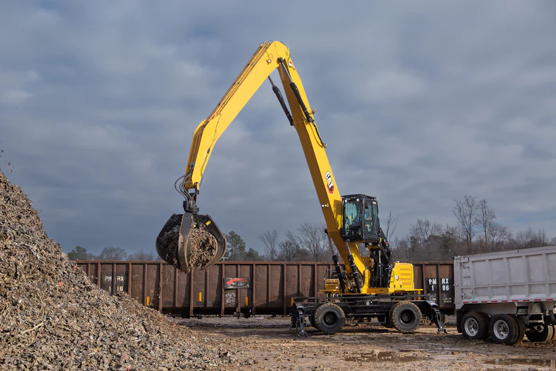 Cat Machine Loading Material Cat debuts new and largest material handler - the MH3050 | Equipment World