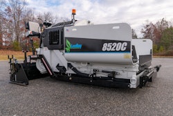 Leeboy 8520C E-Paver electric commercial class paver all white on blacktop trees background