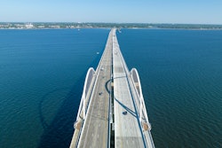 aerial view of new Pensacola Bay Bridge arches over blue water