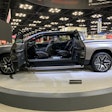 silver electric Ram REV 1500 pickup truck on trade show display