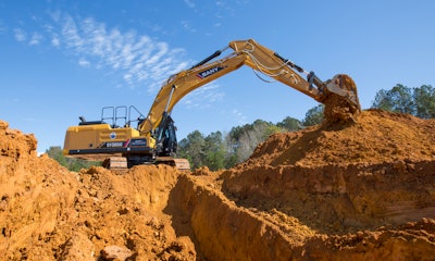 Sany SY385C excavator digging on dirt hill