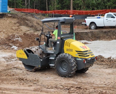 Wacker Neuson RC70 soil compactor padfoot drum on muddy jobsite