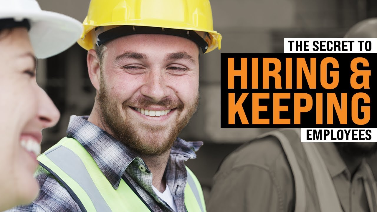 the secret to hiring and keeping employees text with construction workers in safety gear