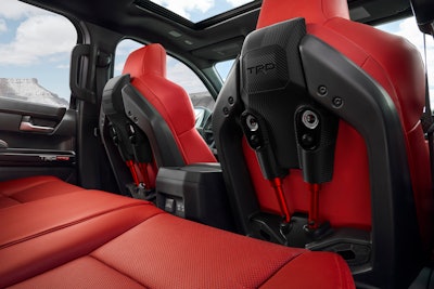 Debuting exclusively on the new TRD Pro is a segment-first IsoDynamic Performance Seat that helps provide a smooth, confidence-inspiring ride for those in the driver and front passenger seats. The goal of this patent-pending feature is to stabilize the driver’s field of vision to improve focus, comfort, and reduce fatigue while on rugged trails. The IsoDynamic Performance Seat uses an air-over-oil shock absorber system allowing for vertical and lateral seat movement simultaneously to dampen body movement and stabilize the head and neck to keep alignment with the spine. This dampening effect is tunable based on body mass and occupant preference and can be bypassed, if desired, via levers on the seatbacks.