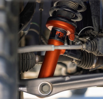 Powerful suspension is at the core of the 2024 Ranger Raptor. Heat-reducing, next-generation FOX 2.5-inch Live Valve Internal Bypass shock shown above.