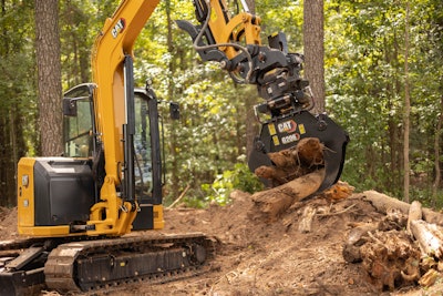 G208 grapple holding logs