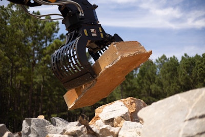 G308 demolition/sorting grapple holding stone brick