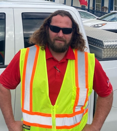 C.J. Bryant killed in work zone crash I-40 N.C. in high visibility yellow orange vest wearing sunglasses
