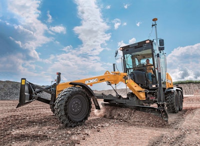 Case 836 AWD motor grader pushing dirt