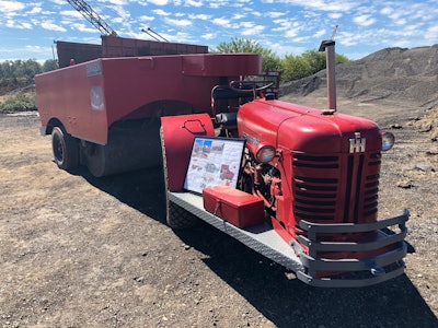 red 1955 Duo-Pactor compactor powered by International Harvester tractor