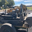 gray 1951 Mead Mighty Mouse dozer on two wheel trailer at HCEA 2022 convention