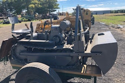 gray 1951 Mead Mighty Mouse dozer on two wheel trailer at HCEA 2022 convention