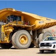 Komatsu autonomous haul truck and Toyota concept autonomous light vehicle.