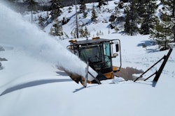 larue T80 snowblower blowing snow off roadside snowbank
