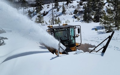 larue T80 snowblower blowing snow off roadside snowbank