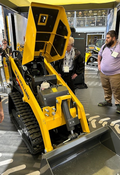 New Holland C314 mini track loader with engine hood open at ConExpo 2023